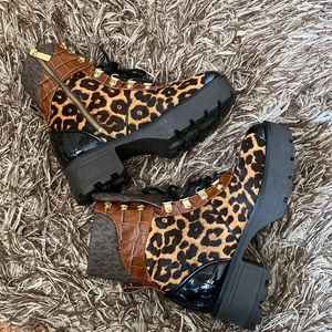 Khloe printed haircalf combat boot by Michael Kors. Great condition!!.